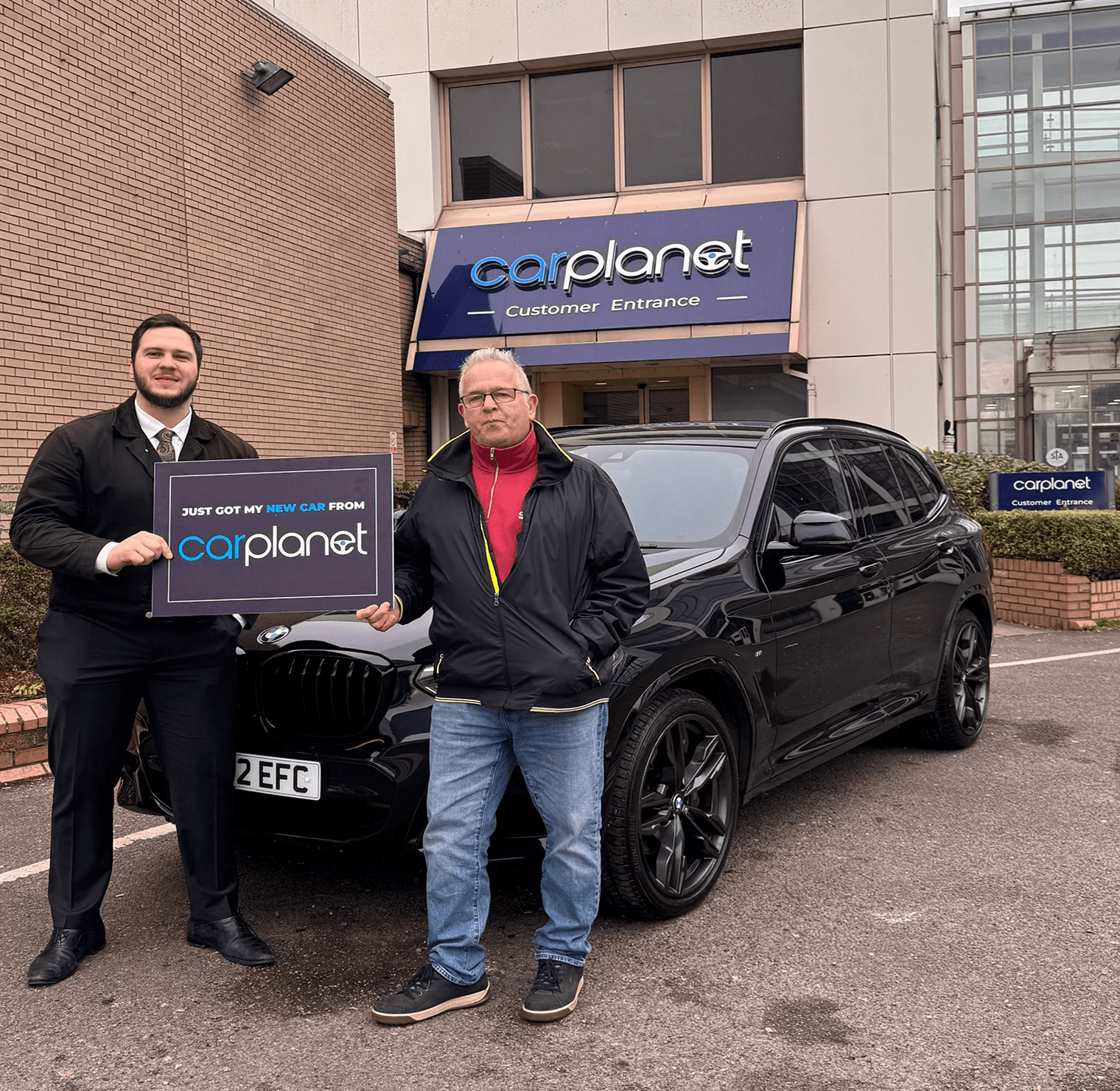 Another happy customer with Car Planet branded sign